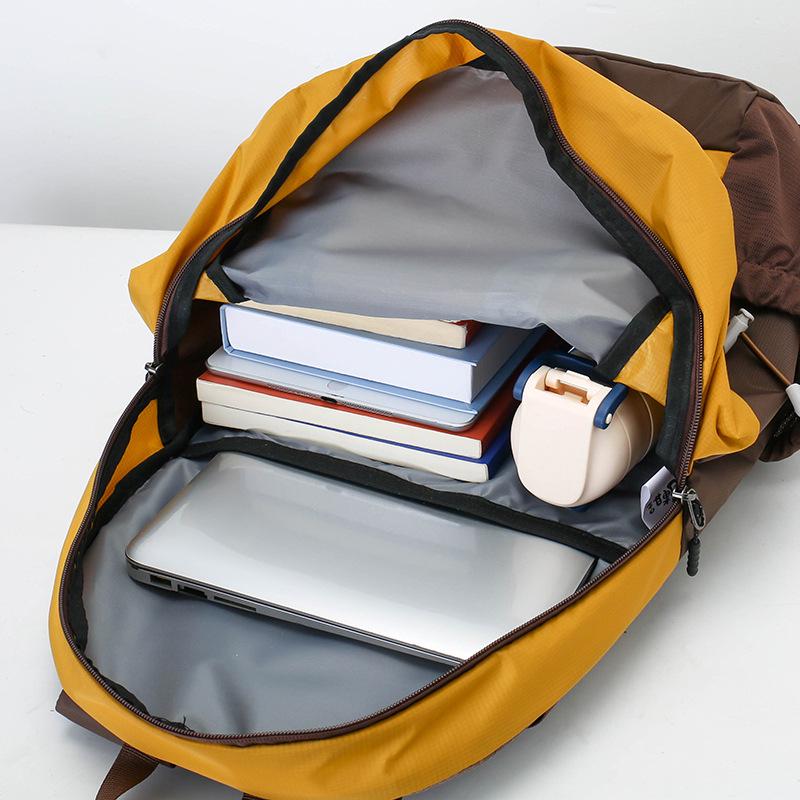 Large Capacity Camel-Style Backpack: Outdoor Travel & School with Spine Protection