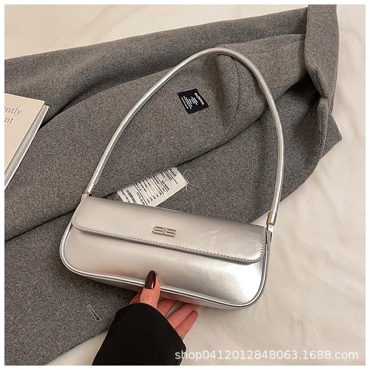 

2025 spring new trendy high-end fashion portable baguette bag women s retro versatile single shoulder oblique span bag серебряный