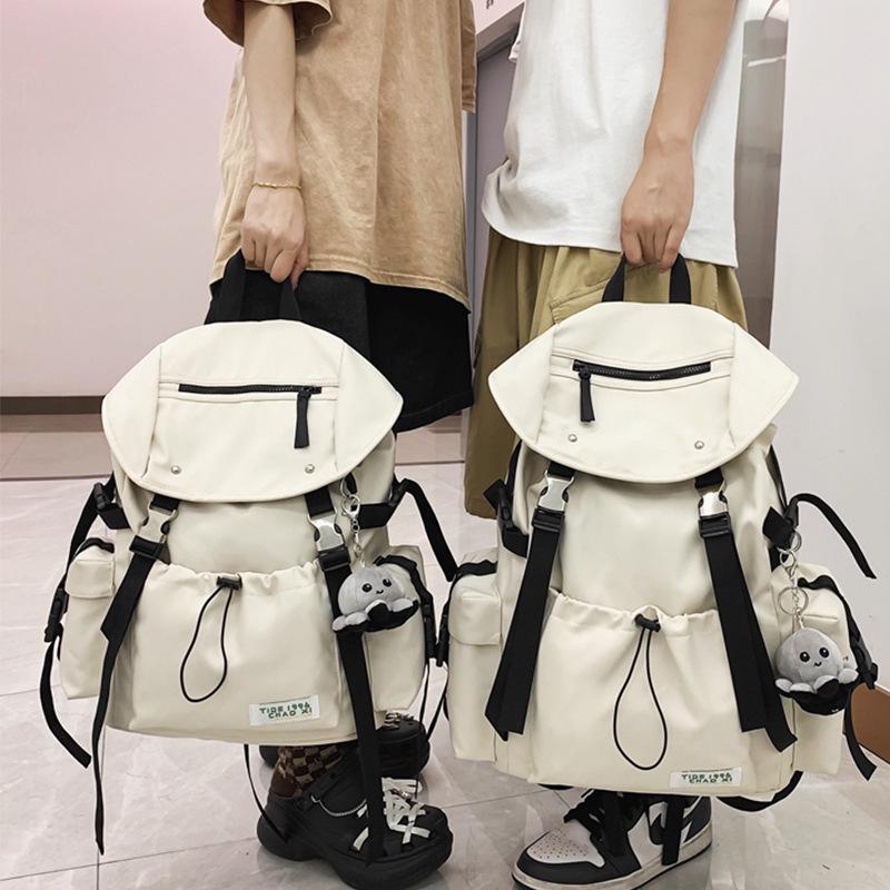 Ryggsäck för män med stor kapacitet och enfärgad design för studenter eller par