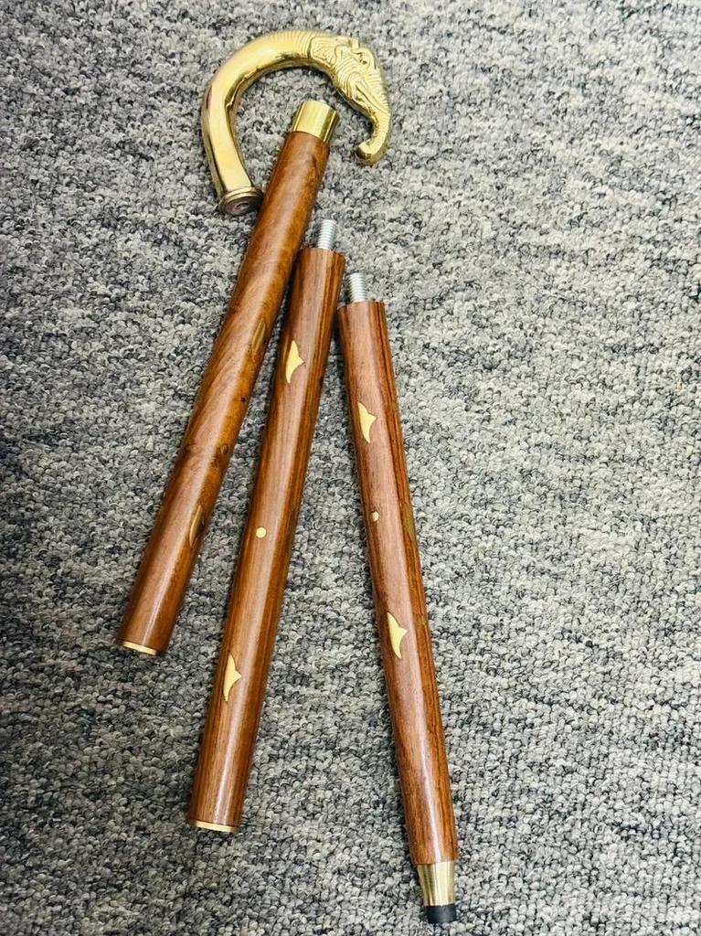 Walking Stick Black Twisted Pole With A Brass Elephant Head Comfortable Handle.