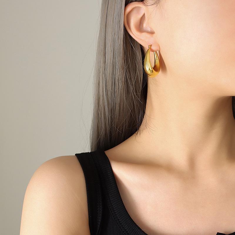 Trendy Gold-Plated U-Shaped Titanium Earrings: European & American Style, No Fading, Fashionable & Personalized.