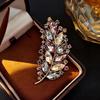 Elegant Rhinestone Animal Brooch: High-End Flower Design for Women's Coats and Accessories