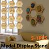 5-1 Stück Waben-Kombinations-Medaillen-Ausstellungsständer Sechseckige Holz-Ausstellungsregale Haus-Marathon-Medaillen-Brett Aufhängerständer Dekor