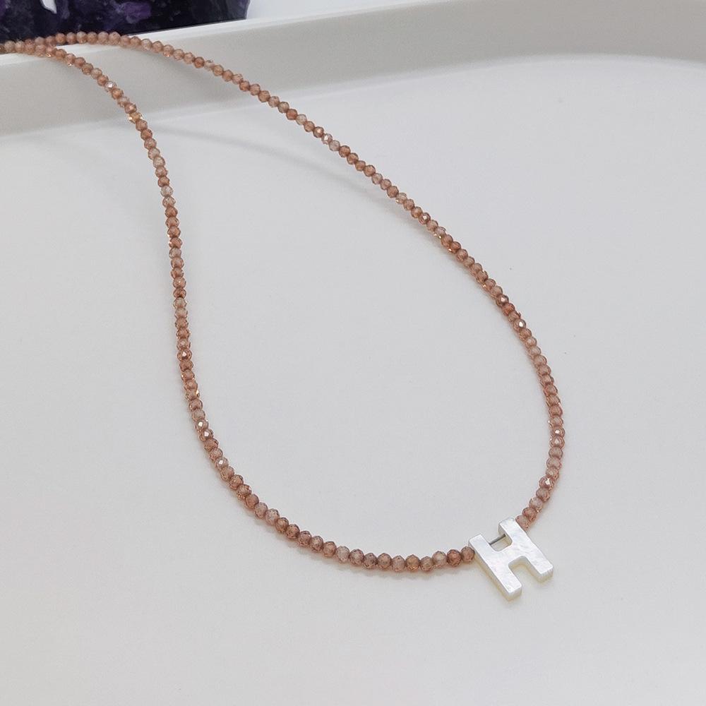 Elegant 2m Zircon Beaded Clavicle Chain: 26-Letter Deep Sea Shell Necklace for Women.