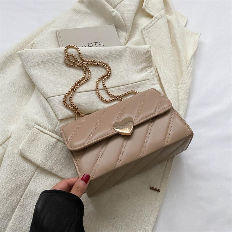 Stilvolle gesteppte PU-Handtasche für Damen in Schwarz, Khaki, Pink und Weiß. Perfekt für den lässigen Chic.