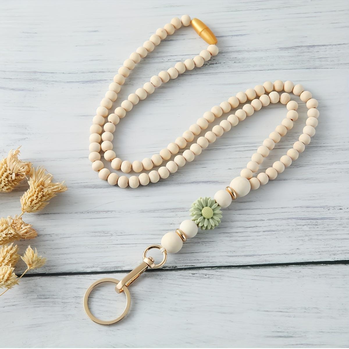

Wooden Beaded Keychain with Silicone Flower Charm - Stylish Lanyard Necklace for Keys, Badges, Light-Colored Beads & Golden Clasp, Key Necklace