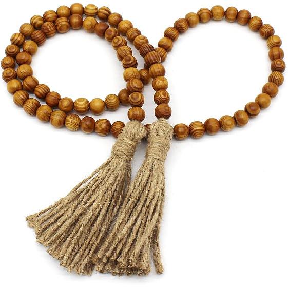 CVHOMEDECO. Wood Beads Garland with Tassels Farmhouse Rustic Wooden Prayer Bead String Wall Hanging Accent for Home Festival Decor. Mix Distressed