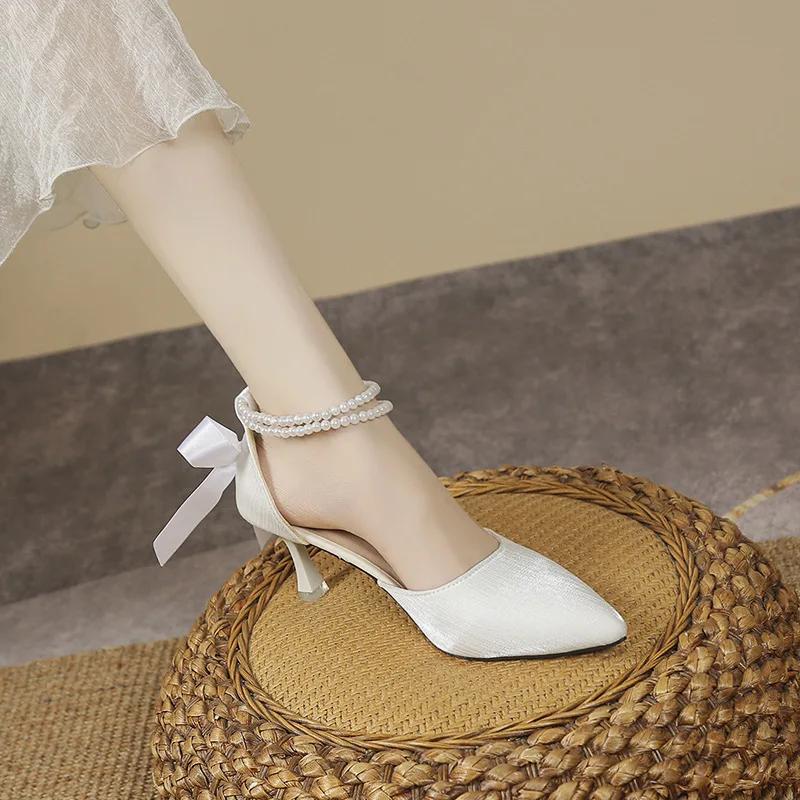 

Fashion New bow high heels Ladies one button hollow sandal Sharp pointed elegant Women s pumps Fashion Baotou Sandals Mujer Zapatos 40 слоновая кость