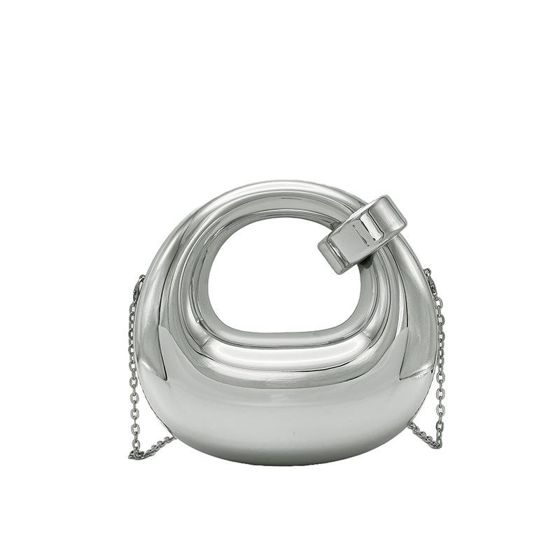 

Acrylic box bag women s 2025 new European and American fashion candy color dumpling bag shiny chain crossbody dinner bag срібний