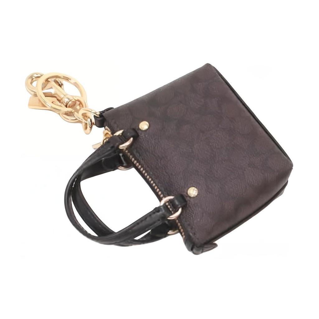Coach Fermeture éclair de galerie Poche extérieure Porte-clés Toile enduite et cuir lisse Mini sac Sacs pour femmes Marron CC895-IMAA8