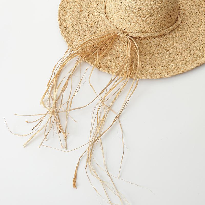 Spring and summer new versatile casual hand-woven straw hat fashionable raffia rough edge beach vacation sun protection simple sun hat