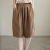Pantaloni semplici casual da donna estivi in cotone e lino retrò letterario a tinta unita con elastico in vita taglia grande pantaloni a cinque punti