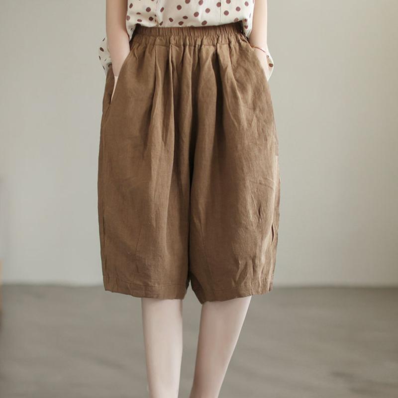 Pantaloni semplici casual da donna estivi in cotone e lino retrò letterario a tinta unita con elastico in vita taglia grande pantaloni a cinque punti
