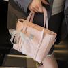 Spring and summer popular niche sweet and cute embossed portable bucket bag Korean version commuter casual versatile messenger bag bag woman