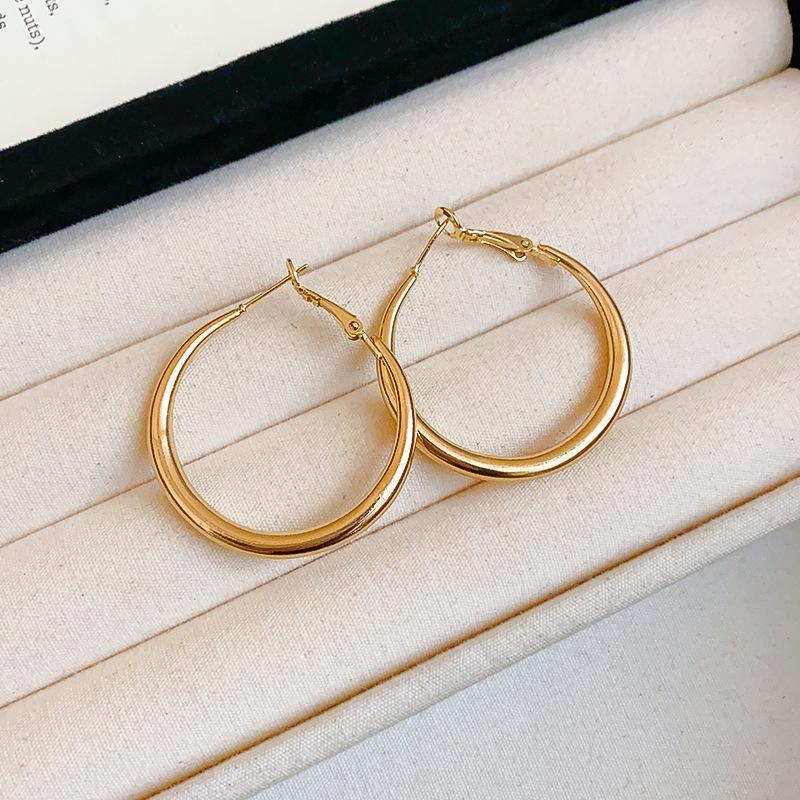 Fashion geometric round earrings French simple metal plain earrings temperament advanced sense light luxury earrings women