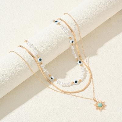 Collier imitation perle, pendentif octagramme rétro superposé, haute qualité féminine, bijoux œil du diable