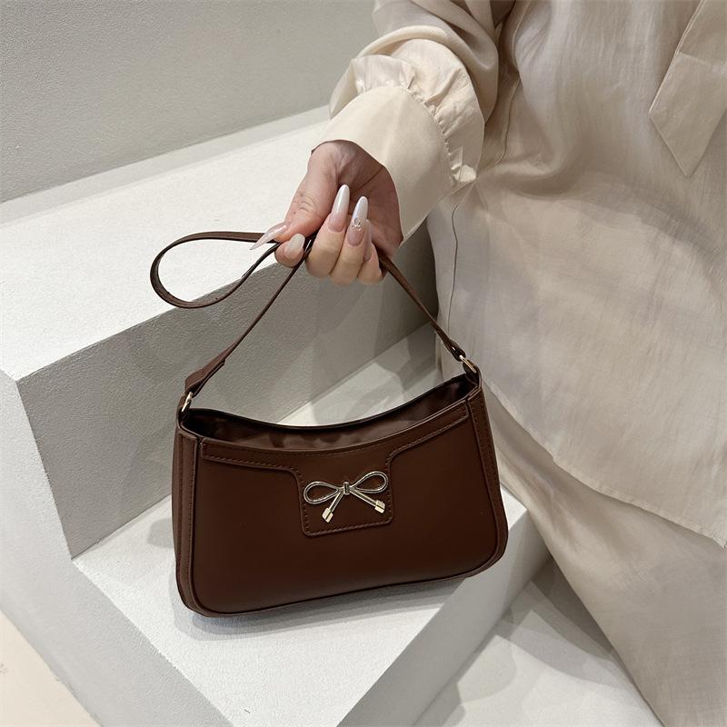 2025 autumn new popular bow solid color large capacity fashion texture simple crossbody armpit women's bag