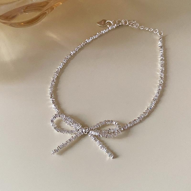 Geometric Silver Bow Knot Ring: Stylish, Versatile, and Fashionable Finger Ring for Women