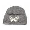 Autumn and winter butterfly jacquard big head circumference knitted hat women's retro warm wool hat street hipster curling edge cold hat