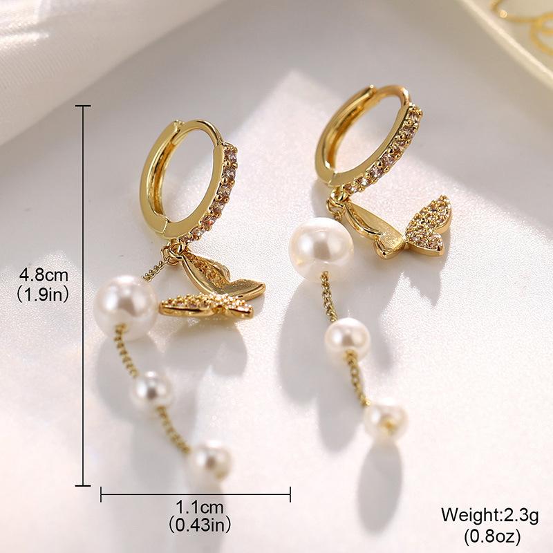 

Pearl bow hollow fringed earrings, small fragrant style ins high-end sense, simple and versatile earrings without fading