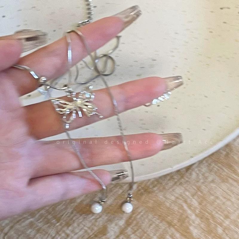 Adjustable pull-out drawstring butterfly necklace light luxury niche pearl tassel silver collarbone chain female