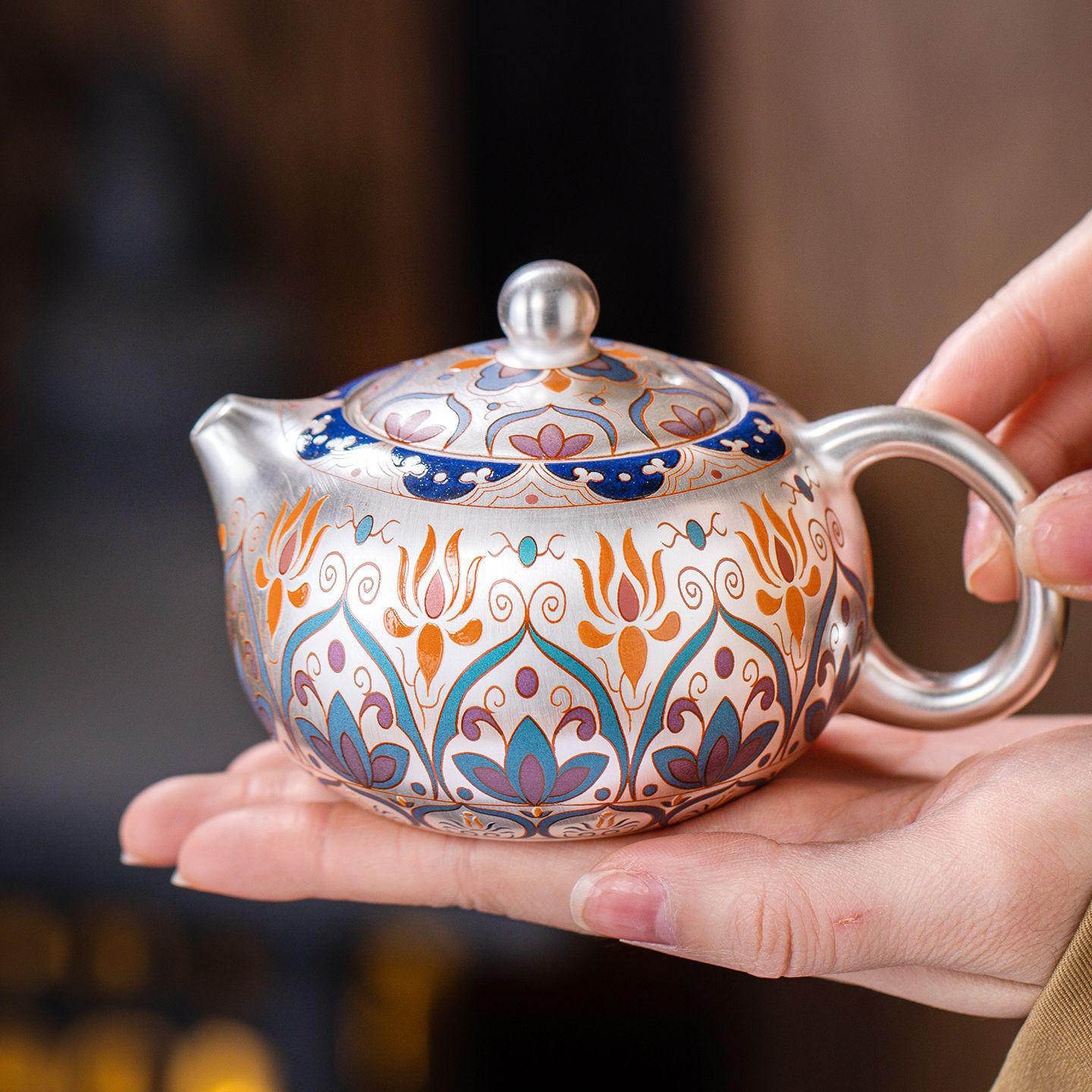 Silver-Plated Dunhuang Xi Shi Teapot Set with Four Cups: Intangible Cultural Heritage Souvenir Gift.
