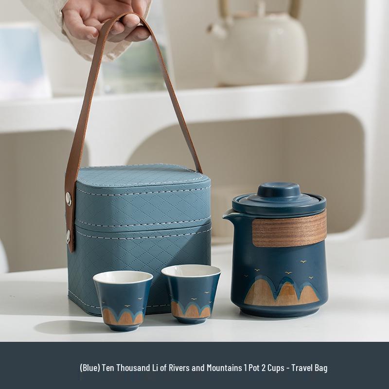 

Rivers & Mountains Portable Ceramic Tea Set: 1 Pot, 4 Cups, Travel Bag - Perfect for Outdoor Brewing