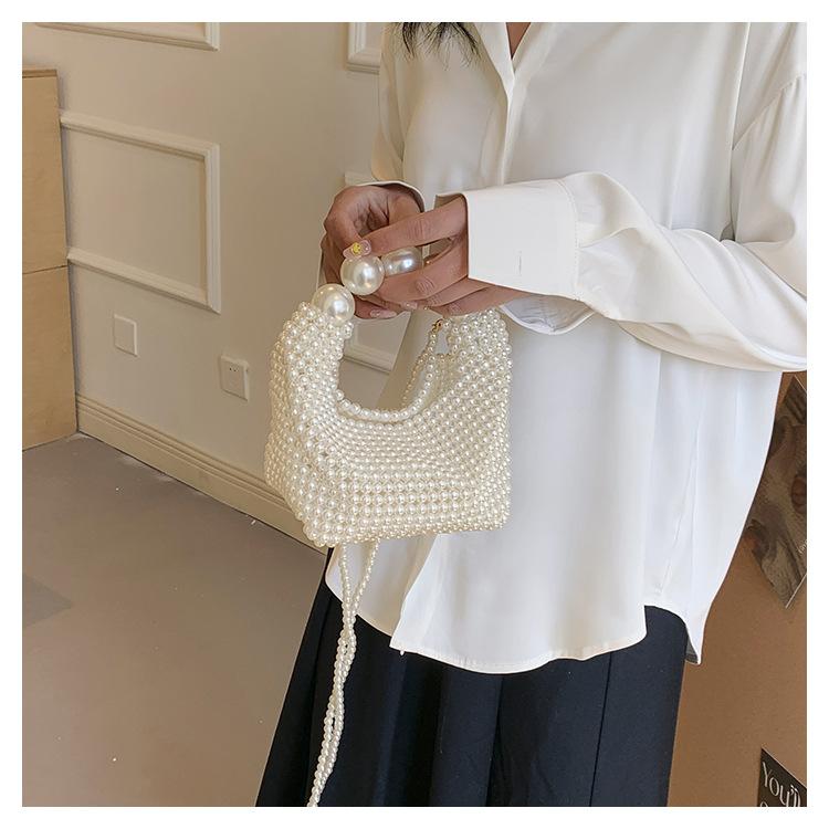 Pure hand-woven dinner bag female retro fairy pearl bag trendy large capacity portable shoulder bag