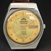 AUTOMATIC 46961 VINTAGE ORIENT CRYSTAL JAPAN MENS GOLDEN DIAL WATCH a707771-1