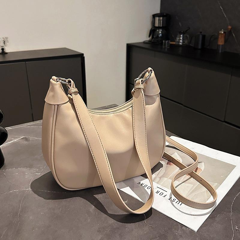 Niche retro bag women's new fashionable large-capacity shoulder commuter dumpling bag versatile messenger bag