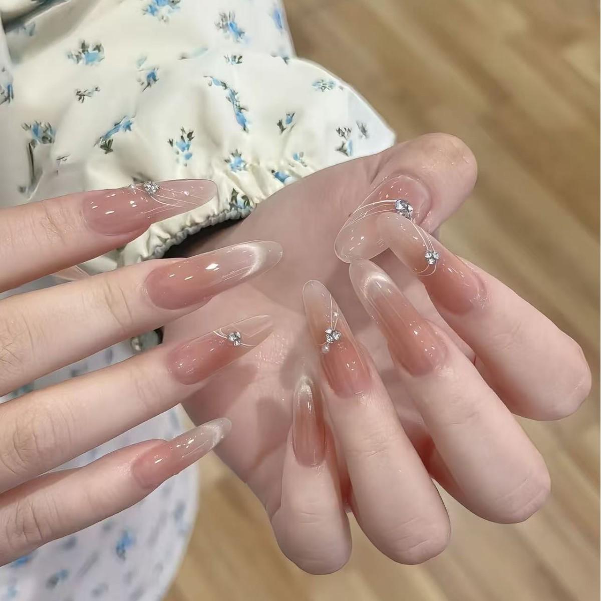 

Human World Cat Eye White Tea Nails: Gentle, Handcrafted, Enhances Whiteness for Celebrity-Inspired Look Small
