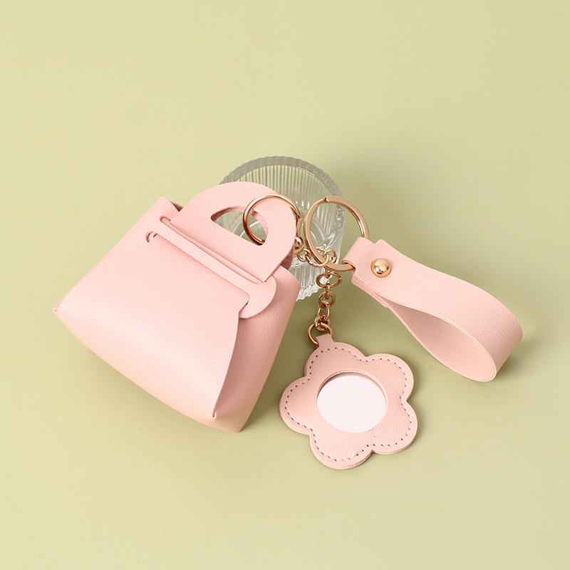 Korean Style Creative PU Leather Keychain: Mini Mirror, Storage Bag, Solid Color Wallet