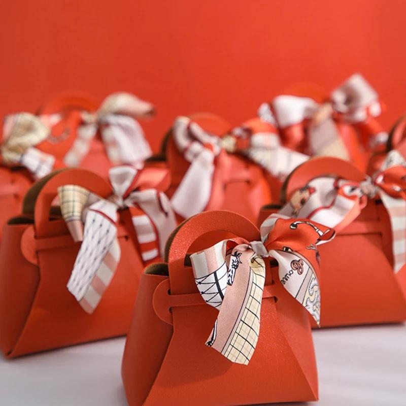 10 pezzi distribuiscono sacchetti regalo in pelle rosa, bomboniere per ospiti, mini borsetta con nastro, scatola per imballaggio di caramelle, decorazioni per feste