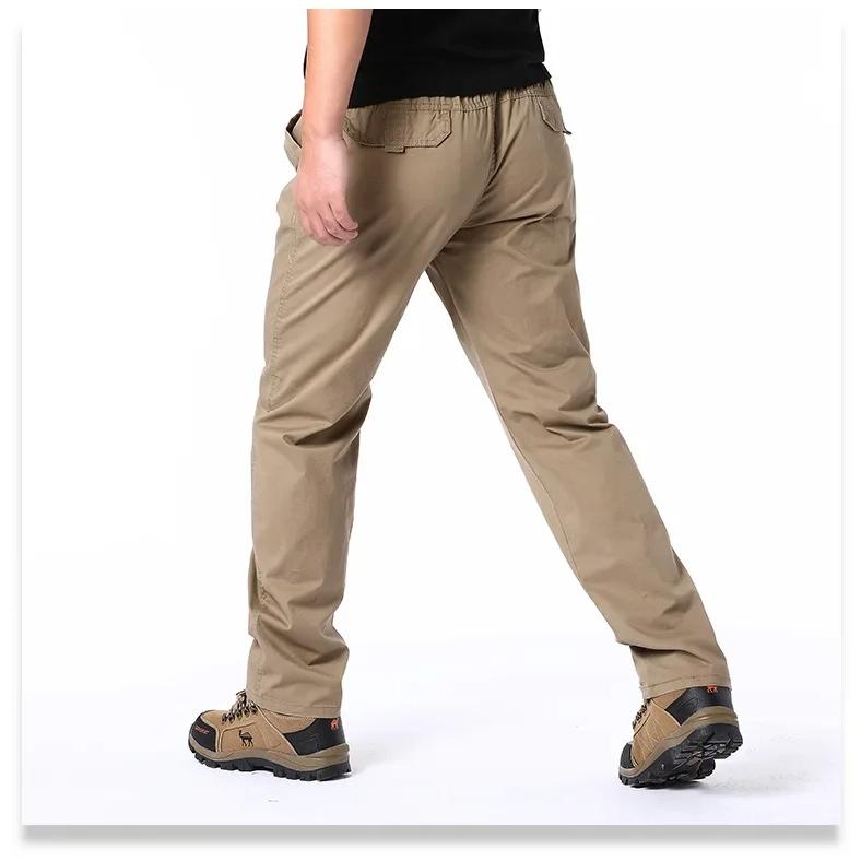 Wiosenne jesienne modne spodnie casualowe dla mężczyzn bawełniane spodnie cargo w jednolitym kolorze z elastyczną talią proste nogawki streetwear męskie spodnie joggers