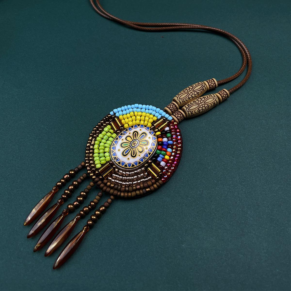 

Непальский ретро-подвеска с кисточкой на цепочке для свитера