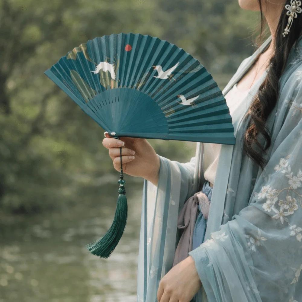 Vintage Bamboo Folding Fan Crane Pattern Traditional Double Side Fan with Tassel Classical Carved Hollowed-Out Fan