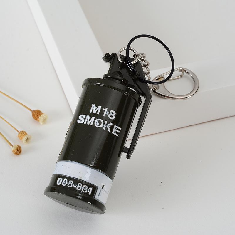 

«Хит продаж: игрушечная металлическая модель автомобиля и брелок для выживания»