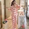A thin milk silk pajama women's spring and autumn sweet age-reducing women's long-sleeved trousers loungewear set