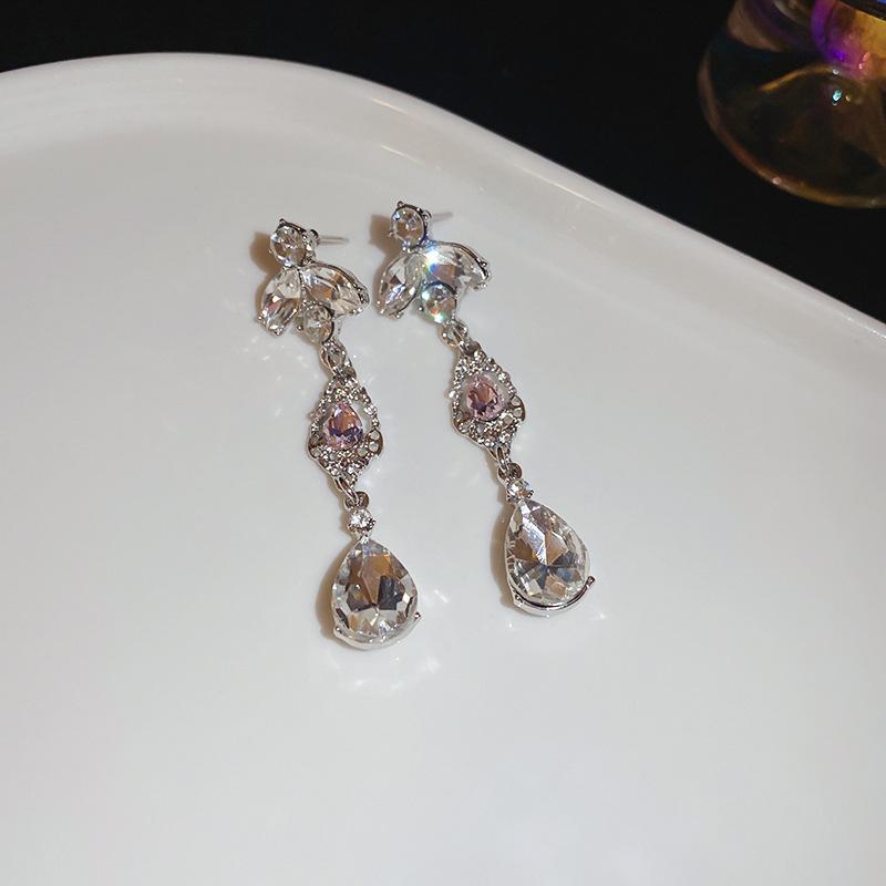 

Silver needle with diamonds, flower water drop fringed earrings, European and American exaggerated new earrings, light luxury high-end earrings, women