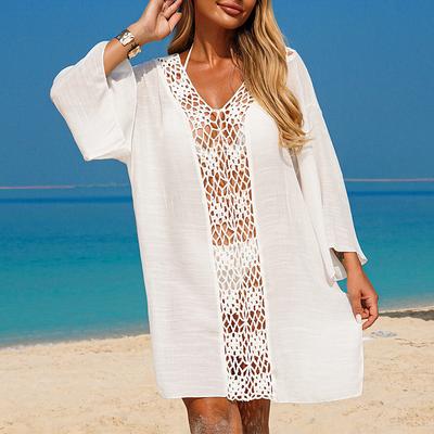 A New Style of Loose and Sun-protective Dress for Women's Beach Vacation with Cutout Hand Hooks and a Patchwork Cardigan