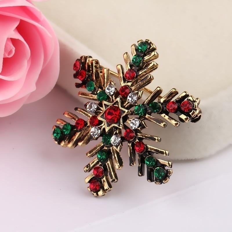

Christmas Snowflake Brooch Creative Gift European and American Colored Crystal Brooch Suit Decoration for Women Enamel Pin Red