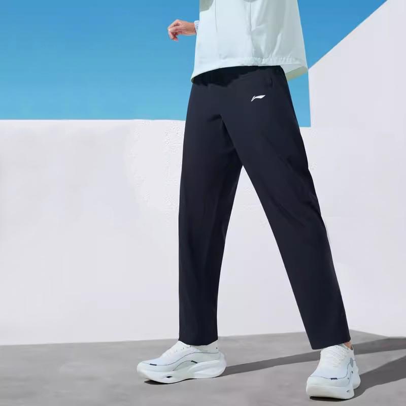 Li Ning Fitness Series Solid Color Mid Waist Comfortable Versatile Breathable Tapered Knit Sports Pants Men pants Black YYKU193-2