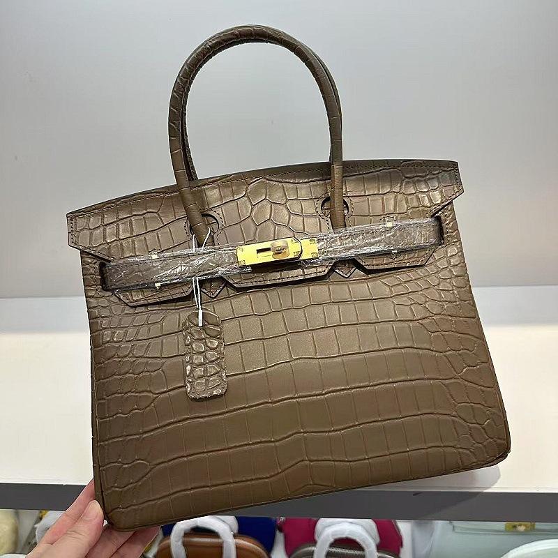 Pelle bovina primo strato motivo alligatore opaca portatile a spalla a tracolla borsa da donna premium transfrontaliera
