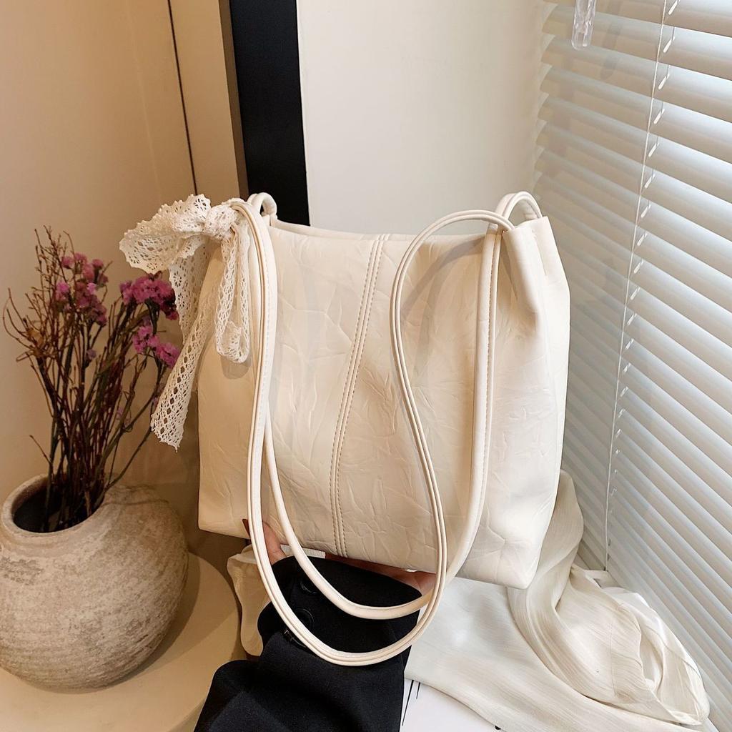 Nischen Silber Achseltasche für Damen Koreanische Bucket Tote High-End Schultertasche mit hoher Erscheinungswert