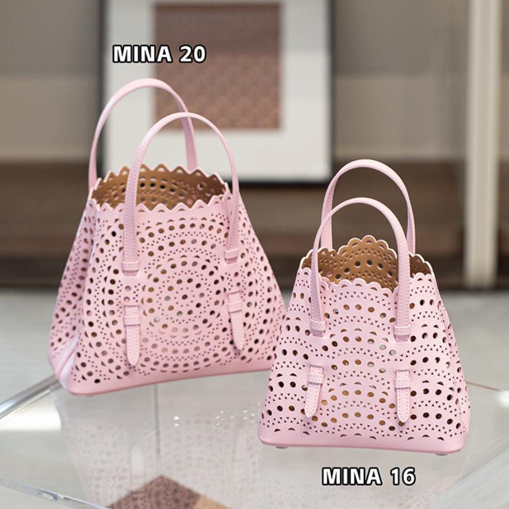 Velkoobchodní továrna prémiová niche vyřezávaná dutá taška na zeleninu Mina kožená dámská taška přes rameno crossbody tote taška