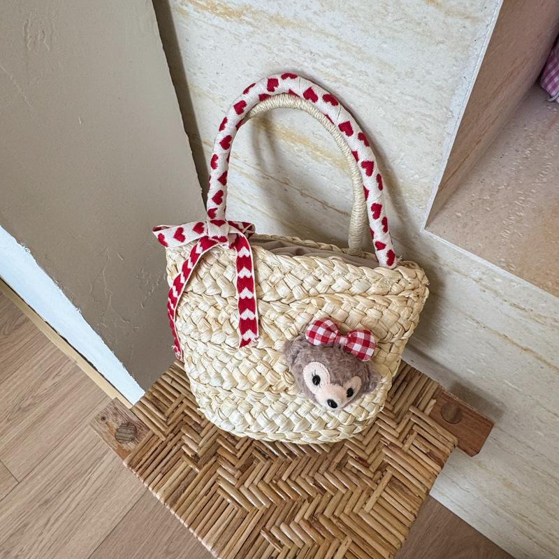 

Handwoven straw bag women s summer new portable bucket bag leisure seaside vacation beach bag