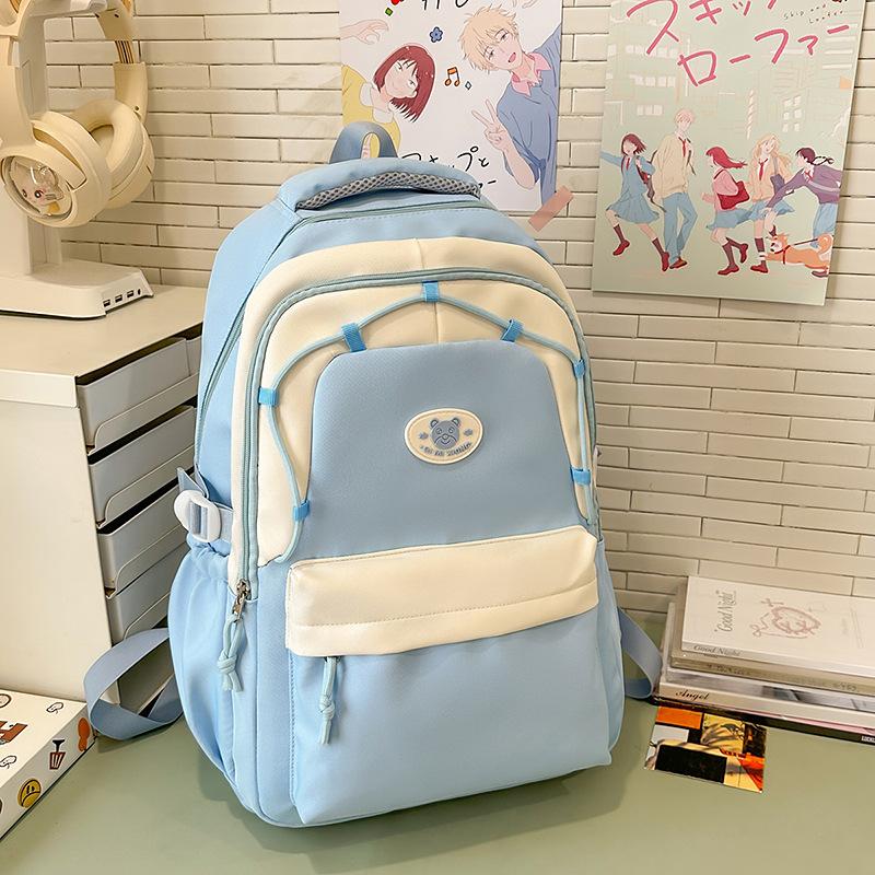New Decompression Large Capacity Schoolbag Junior High School Girls and Senior High School Students Light Campus Backpack.