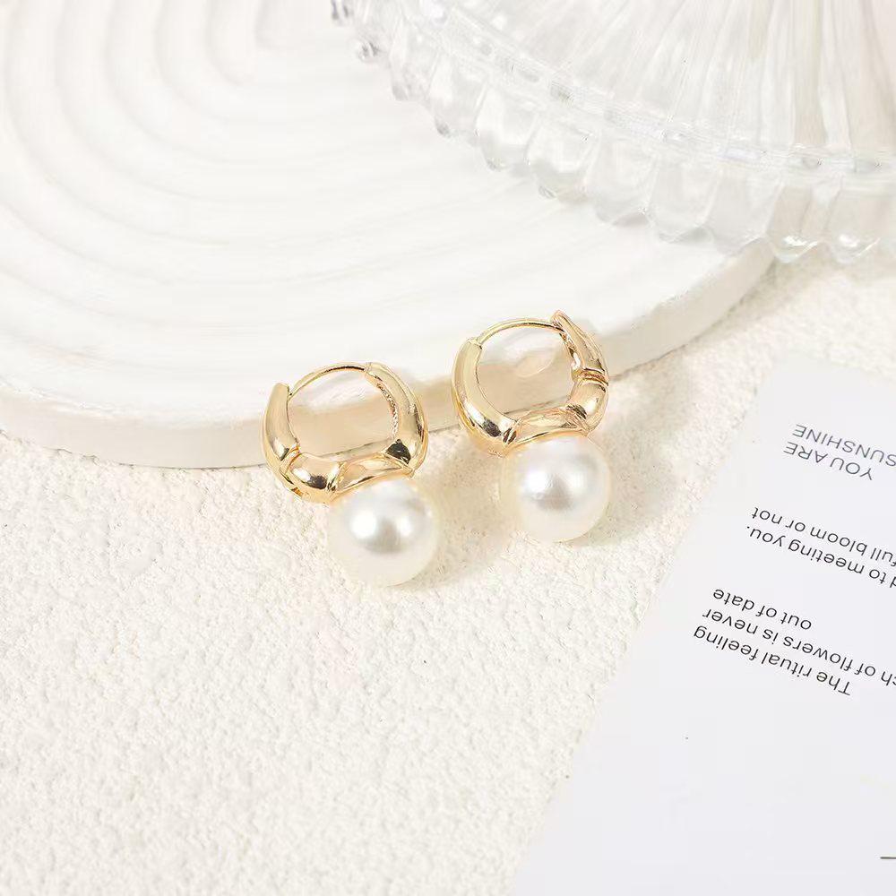 Elegant New Year Earrings: Gold & Pearl Statement Drops with Unique Design