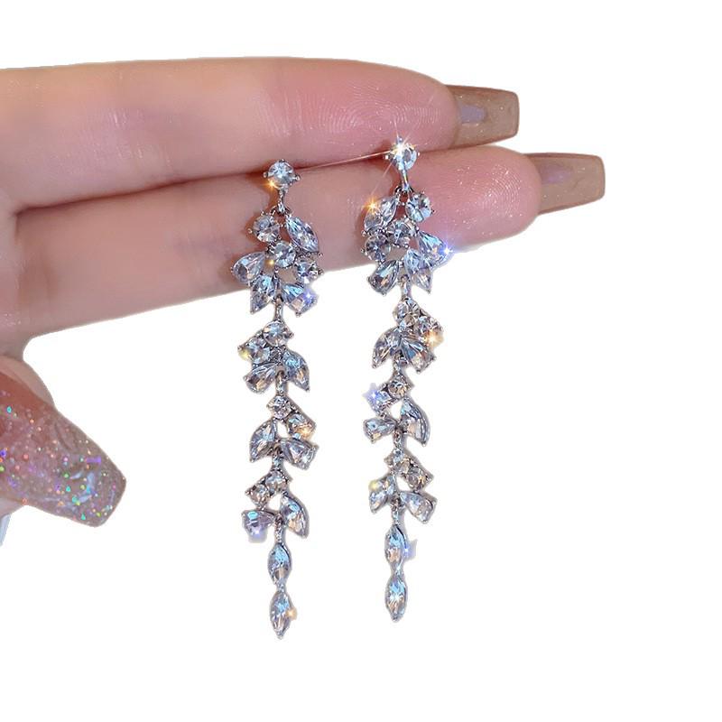 High-End Leaf Design Rhinestone Tassel Earrings for Women - Unique, Luxurious, Niche Dangle Studs.