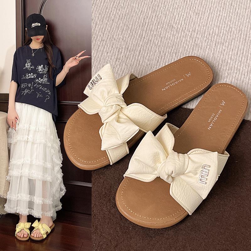 Summer flat-bottomed cool slippers women's new fashion outer wear holiday versatile bow student seaside beach shoes